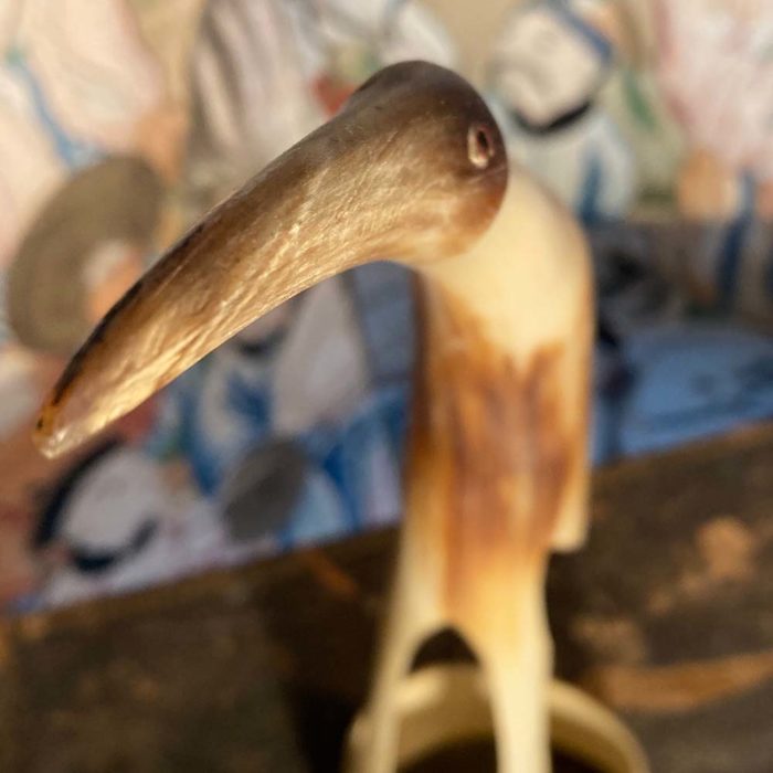 Carved horn bird sculpture