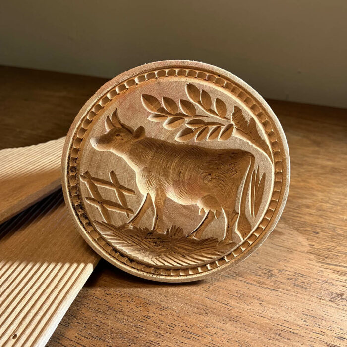Antique hand-carved butter stamp and pats